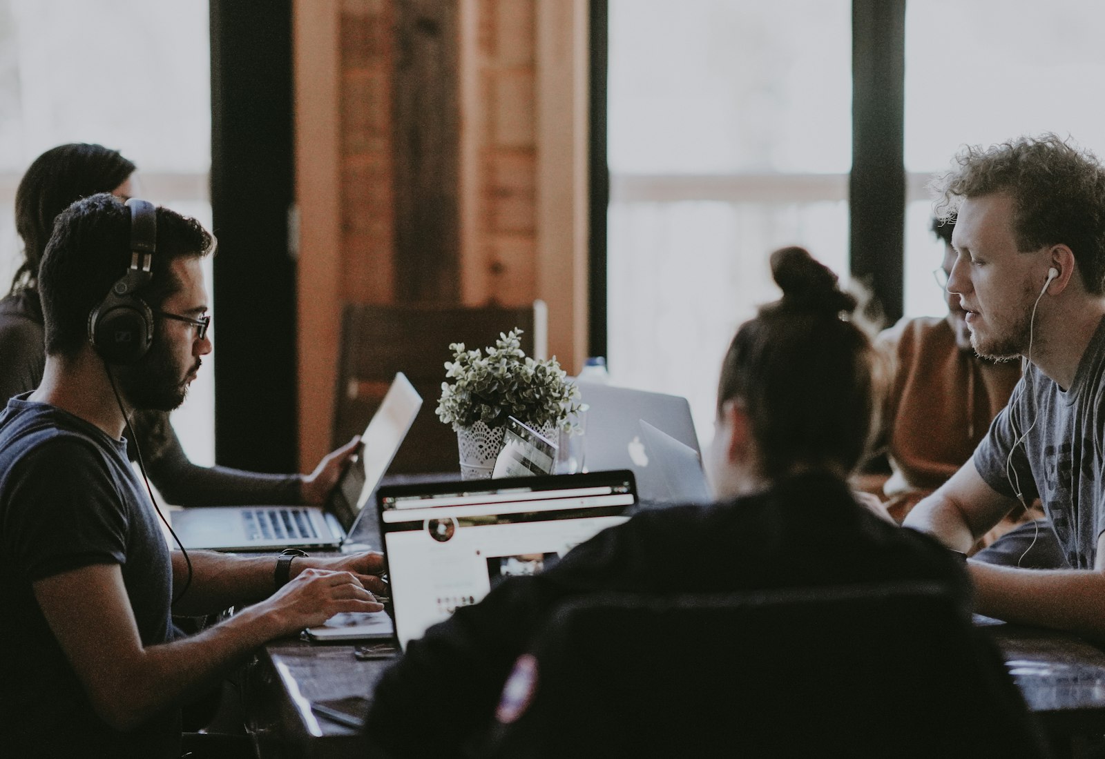 Technology professionals collaborating in a modern workplace