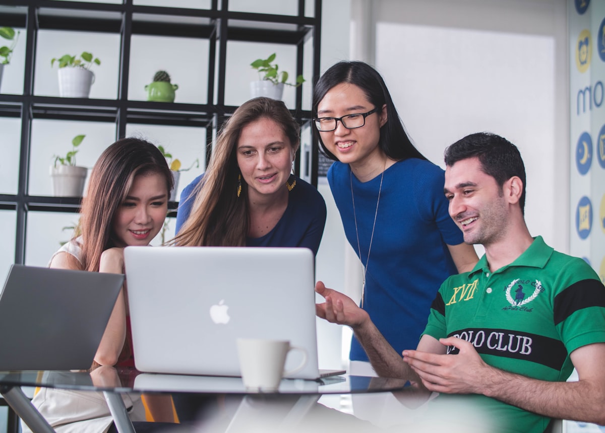 Recruitment team reviewing candidate profiles together